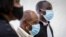 Paul Rusesabagina, center, who inspired the film 'Hotel Rwanda' for saving people from genocide, appears at the Kicukiro Primary Court in Kigali, Rwanda, on Sept. 14, 2020.