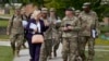 FILE - Army Secretary Christine Wormuth walks during a tour with soldiers at Fort Jackson, a U.S. Army Training Center, Sept. 25, 2024, in Columbia, S.C. 