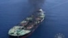 This photo released by the European Union's Operation Aspides naval force shows the Greek-flagged oil tanker Sounion burning in the Red Sea following a series of attacks by Yemen's Houthi rebels on, Sept. 2, 2024.