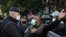 A demonstrator gestures during a protest against the lockdown and worsening economic conditions, amid the spread of the coronavirus disease (COVID-19), in Beirut, Lebanon, Jan 28, 2021.