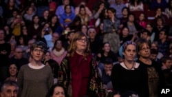 Jewish Orthodox women attend an event celebrating the completion of the 7 1/2-year cycle of daily study of the Talmud, in Jerusalem, Jan. 5, 2020.