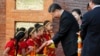 FILE - Chinese President Xi Jinping is greeted by Nepalese children upon arrival in Kathmandu, Nepal, Oct 12, 2019. 