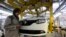 FILE - A female employee works in a Renault factory in Oran, west of Algiers.