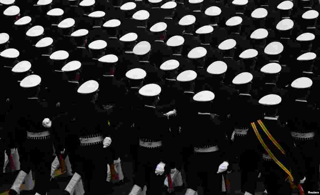 Indian soldiers march during a full dress rehearsal for the Republic Day parade in New Delhi.