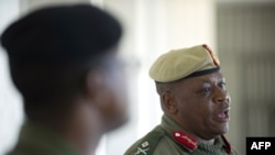 Lesotho's army Major General Lineo Poopa addresses the media at the Makoanyane Barracks in Maseru, on Sep. 1, 2014.