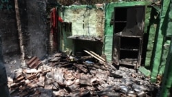 The charred room of a Muslim jute mill laborer in Telinipara, two days after it was set aflame by a Hindu mob during communal violence on May 12. During three days of violence, rioters destroyed dozens of houses and shops. (Shaikh Azizur Rahman/VOA)