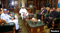 Gambian President Yahya Jammeh meets with with the West Africa head of delegation during the election crisis mediation at the presidential palace Banjul, Gambia, Dec. 13, 2016