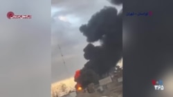 آتش و دود غلیظ ناشی از حمله به مواضعی در جاده لواسان تهران
