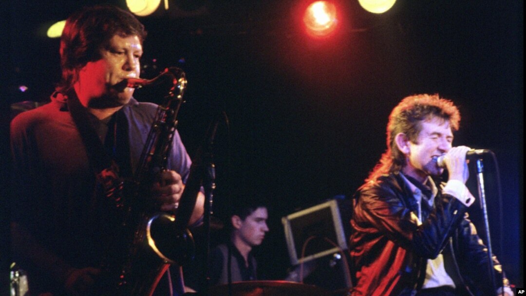 FILE- Bobby Keys on saxophone and bassist Ronnie Lane (R) join The Tremors at the Steamboat, in Austin, Texas, May 1987. 