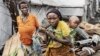 Internally diplaced persons leave the Lwashi displaced camp in Goma, on February 11, 2025.