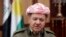 FILE - Kurdish Regional Government President Massoud Barzani conducts an interview in Irbil, Iraq.