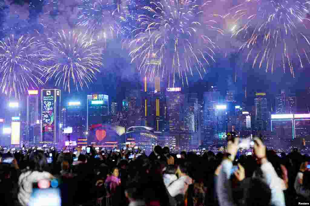 Fireworks explode over the Victoria Harbor on the second day of the Lunar New Year of the Snake, in Hong Kong, China.