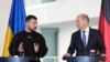 Germany's Chancellor Olaf Scholz, right, and Ukraine's President Volodymyr Zelenskyy address a media conference at the chancellery in Berlin on May 14, 2023. (Matthias Schrader/AP)