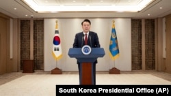 South Korean President Yoon Suk Yeol speaks at the presidential office in Seoul, South Korea, Dec. 12, 2024.