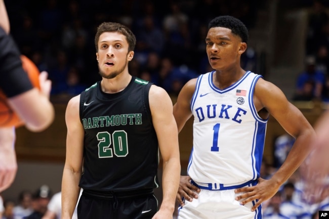 FILE - Dartmouth's Romeo Myrthil (20) stands next to Duke's Caleb Foster (1) during the second half of an NCAA college basketball game in Durham, N.C., Monday, Nov. 6, 2023. (AP Photo/Ben McKeown, File)