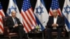 ARCHIVO - El presidente Joe Biden, a la izquierda, con el primer ministro de Israel, Benjamin Netanyahu, mientras se une a una reunión del gabinete de guerra israelí en Tel Aviv el 18 de octubre de 2023.