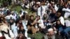 Newly freed Taliban prisoners are seen gathered at Pul-i-Charkhi prison, in Kabul, Afghanistan, May 26, 2020. 