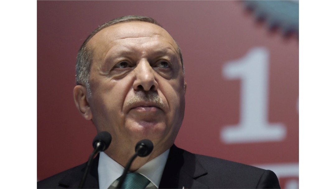 Turkey's President Recep Tayyip Erdogan speaks during a meeting of a pro-government trade-union, in Ankara, Turkey, July 10, 2019. Erdogan has confirmed that he fired the Central Bank chief over his refusal to cut interest rates.