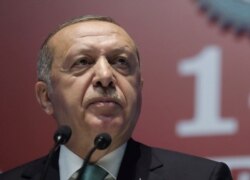 FILE - Turkey's President Recep Tayyip Erdogan speaks during a meeting of a pro-government trade-union, Ankara, Turkey, July 10, 2019.
