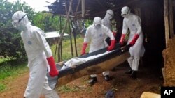 Ebola health care workers on the outskirts of Monrovia, Liberia. Nov. 8, 2014. 