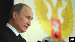  Russia's President Vladimir Putin addresses Russian Ambassadors during their meeting in the Foreign Ministry, in Moscow, July 9, 2012. 