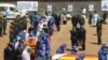 Coffins of Minister of Foreign Affairs Sibusiso Moyo, Transport Minister Joel Biggie Matiza and former head of prisons Paradzai Zimond, in Harare, Jan. 27, 2021. (Columbus Mavhunga/VOA)