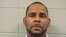 In this Wednesday, March 6, 2019 booking photo released by the Cook County Sheriff’s Office is R. Kelly. A Cook County Sheriff's Office official says singer Kelly won't be released from jail until he pays $161,000 in back child support he owes.