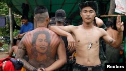 Myanmar civilians train in a forest camp to combat with the military