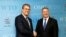 Roberto Azevedo (L), director-general of the World Trade Organization (WTO), greets Britain's International Trade Secretary Liam Fox (R) before a meeting in Geneva, Switzerland, Sept. 27, 2016. 