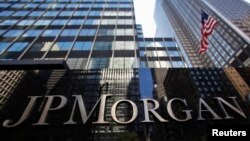 A JP Morgan Chase & Co sign is seen outside of the bank's headquarters in New York September 19, 2013.
