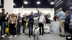 FILE - A Unitree H1 robot is displayed at a Unitree booth at the CES tech show Jan. 8, 2025, in Las Vegas.