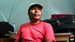 FILE - Jailed anti-logging activist Isidro Baldenegro Lopez speaks to a reporter at the Parral prison, south of the U.S. border in Mexico, May 31, 2003. Baldenegro was killed over the weekend.