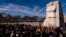 FILE - People attend a wreath-laying ceremony at the Martin Luther King Jr. Memorial marking MLK Day in Washington, Jan. 16, 2023.