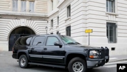 A vehicle believed to transport Paris attacks suspect Salah Abdeslam after his first hearing before French judges departs the courthouse in Paris, France, May 20, 2016. 