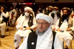 FILE - Deputy Head of Political Office of the Taliban Abdul Salam Hanafi, attends the opening session of the peace talks between the Afghan government and the Taliban in Doha, Qatar, Sept. 12, 2020.