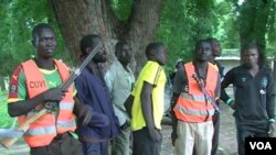 FILE - Members of self-defense groups are seen guarding a school at Fotokol, Cameroon. (M.E. Kinzeka/VOA)