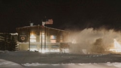 In this photo provided by Mammoth Mountain Ski Area, MMSA, snow continues falling with storm totals over four feet in Mammoth Mountain in Mammoth Lakes, Calif., early Wednesday, Dec. 15, 2021. 