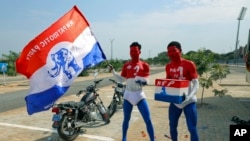 FILE - Supporters of presidential candidate and Vice President Mahamudu Bawumia pose for a photograph during the final rally of the New Patriotic Party (NPP), in Accra, Dec. 5, 2024,