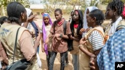 FILE—Mouhamed Sall, who is deaf, communicates using sign language at the Guinaw Rail Sud public high school in Pikine, Senegal, March 18, 2024.