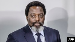 Le président sortant Joseph Kabila dans un bureau de vote à Kinshasa, 30 décembre 2018.