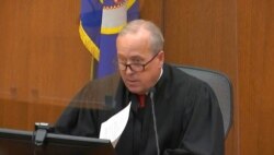 In this image taken from video, Hennepin County Judge Peter Cahill presides over the sentencing of former Minneapolis police Officer Derek Chauvin, June 25, 2021.