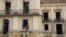 Firefighters spray water on the National Museum of Brazil after a fire in Rio de Janeiro, Brazil, Sept. 4, 2018. 