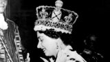  In this June 2, 1953 file photo, Britain's Queen Elizabeth II wearing the bejeweled Imperial Crown and carrying the Orb and Scepter with Cross, leaves Westminster Abbey, London, at the end of her coronation ceremony