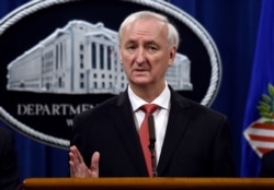 Deputy Attorney General Jeffrey A. Rosen hold press conference at the Department of Justice in Washington, Sept. 22, 2020.