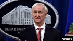 Deputy Attorney General Jeffrey A. Rosen hold press conference at the Department of Justice in Washington, Sept. 22, 2020.