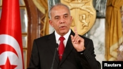 Tunisian Prime minister designate Habib Jemli speaks during a news conference in Tunis, Jan. 1, 2020. 