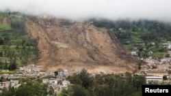 A view shows the site of a landslide triggered by heavy rains in Alausi, Ecuador March 28, 2023.