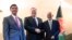US Secretary of State Mike Pompeo, center, shakes hands with Afghan President Ashraf Ghani, right, as US Secretary of Defense Mark Esper watches during the 56th Munich Security Conference (MSC) in Munich, Feb. 14, 2020. 