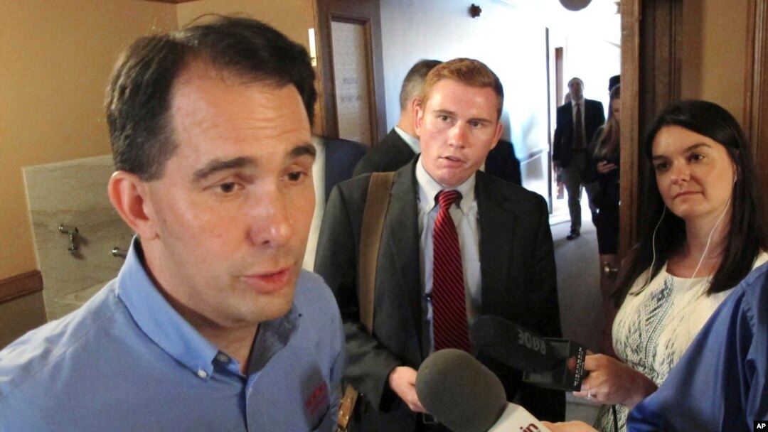 Wisconsin Gov. Scott Walker speaks to the media Tuesday, Aug. 1, 2017, in Madison, Wis.