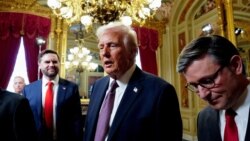 FILE - Newly sworn-in U.S. President Donald Trump speaks with House of Representatives Speaker Mike Johnson following a signing ceremony in the President’s Room following the 60th inaugural ceremony on Jan. 20, 2025, at the U.S. Capitol in Washington.